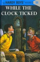 While the Clock Ticked (Hardy Boys, Book 11) – Hardcover – VERY GOOD
