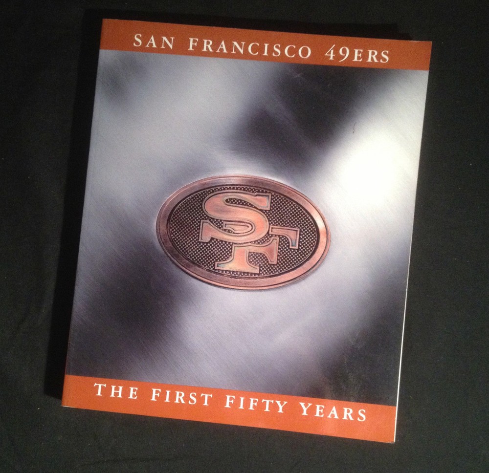 San Francisco 49ers First Fifty Years; inscribed by Ronnie Lott