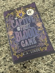 NEW- Captive and the First Blood Game by K. A. Linde (2025, Trade Paperback)