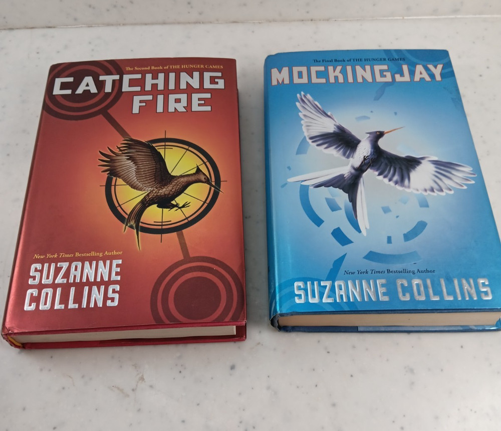Catching Fire And Mockingjay By Suzanne Collins Hardcover Books Hunger games