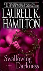 Swallowing Darkness: A Novel (Merry Gentry) – Mass Market Paperback – GOOD