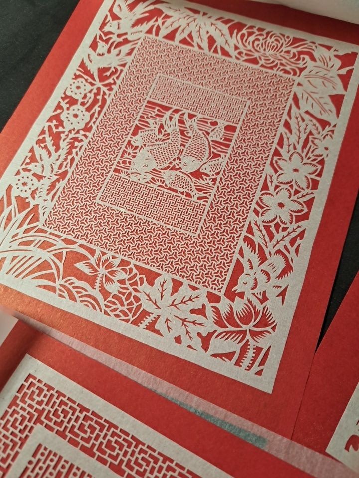 Chinesische Scherenschnitte: Spielende Meeresbewohner – Chinese Folk Paper-Cuts: